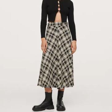Imagen secundaria 1 - Falda midi de cuadros, el truco de las royals para conseguir un look perfecto que hemos encontrado baratísimo en El Corte Inglés y Mango