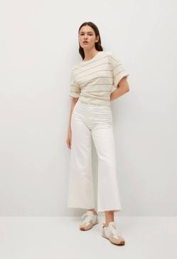 Imagen secundaria 2 - El cierre es es mediante cremallera y botón