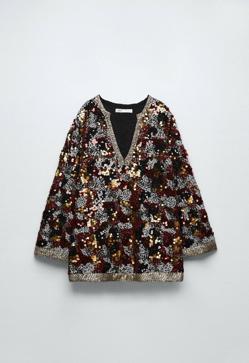 Imagen secundaria 2 - Estos son los espectaculares y elegantes jerséis de Zara con los que tu look de día o noche será de 10: solo necesitas combinarlos con un pantalón negro