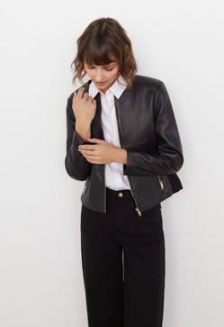 Imagen secundaria 2 - La cazadora con tachelas, la biker negra y la chaqueta de piel combinada con punto