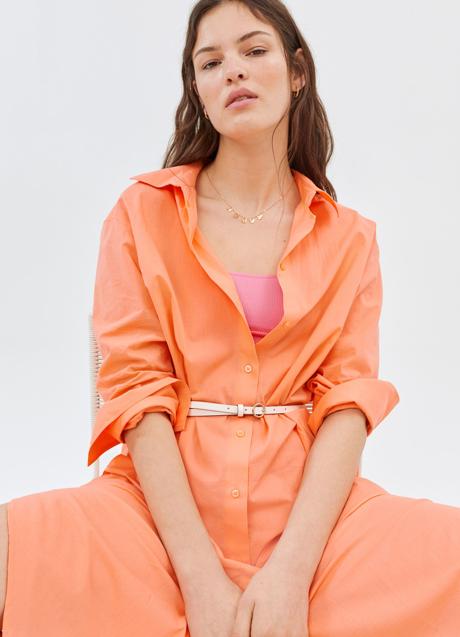 Imagen - Este vestido camisero naranja de H&M cuesta 19,99 euros.