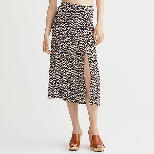 Imagen principal - La falda animal print en marrón oscuro, negra con estampado floral y estampado minifloral en naranja