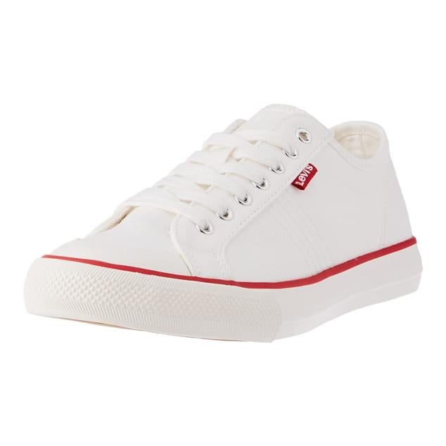 Zapatilla baja elaborada en lona de color blanco con una línea roja. Suela plana de dos centímetros. Precio: 38,25 euros en Amazon. Cómpralo aquí