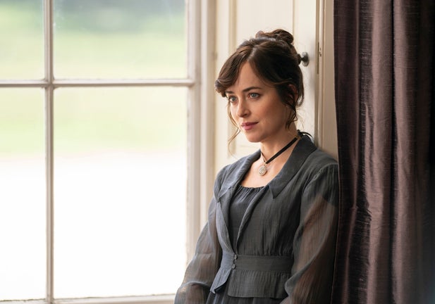 DAKOTA JOHNSON as ANNE ELLIOT in PERSUASION. Photo Credit: Nick Wall/Netflix © 2021