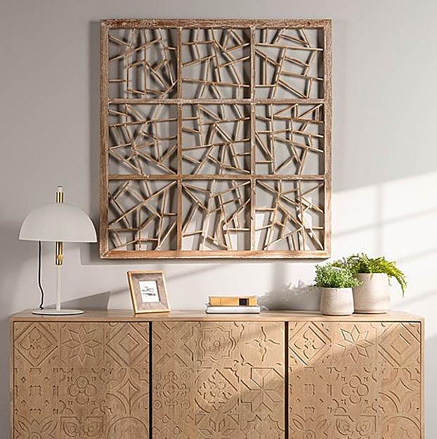 La luz en un recibidor es vital para que la bienvenida al hogar se a aún más placentera.