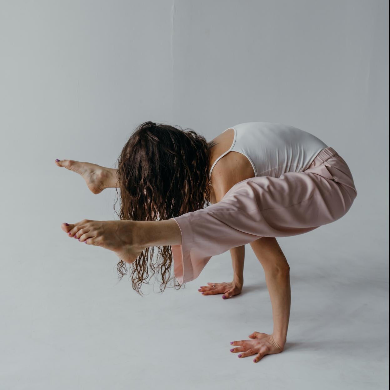 Postura Tittibhasana