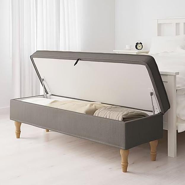 Este recibidor dispone de una tapa que se abre para almacenar cosas dentro.