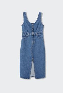 Imagen secundaria 2 - El vestido vaquero más buscado del momento está en Mango. Es tipo peto, lleva botones y lo podrás estrenar ahora con tu blusa blanca preferida. Peto vaquero de Mango (39,99 euros). 