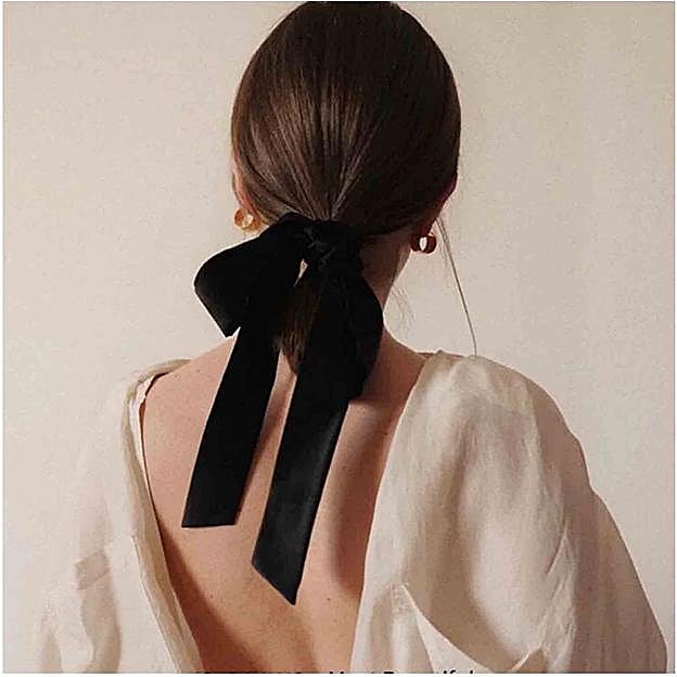 Lazo de color negro para el cabello en terciopelo.