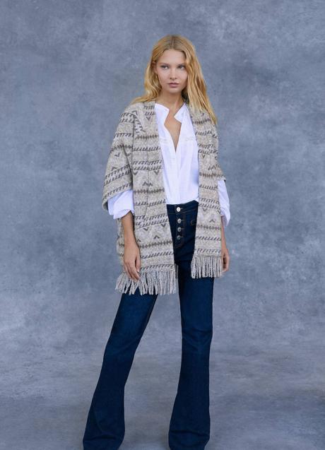 Imagen - Poncho a cuadros con estampaod étnico y flecos
