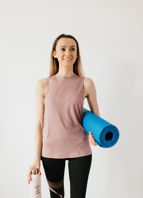 Imagen - Mujer con equipamiento deportivo/PEXELS