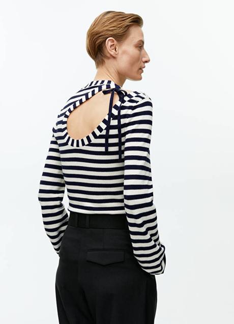 Imagen - Jersey con escote trasero de Arket, 69€.