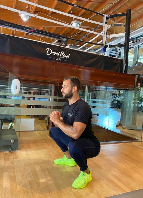 Imagen - Lukasz Dzwiga realizando la sentadilla sumo. / David Lloyd.