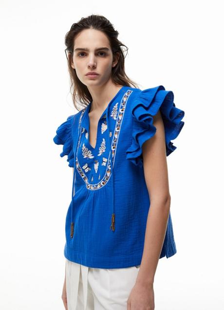 Imagen - Blusa azul de Sfera (23,99 euros)
