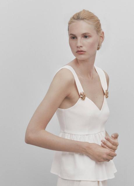 Imagen - Blusa con peplum y adornos dorados