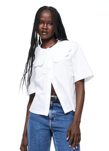 Imagen - Blusa blanca con cuello bebé de H&M (29,99 euros)