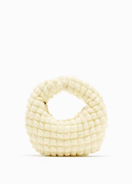 Imagen - Bolso saco de color blanco, 19,95 euros.