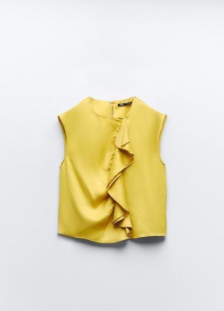 Imagen - Blusa amarilla con volantes de Zara. Foto: Zara.