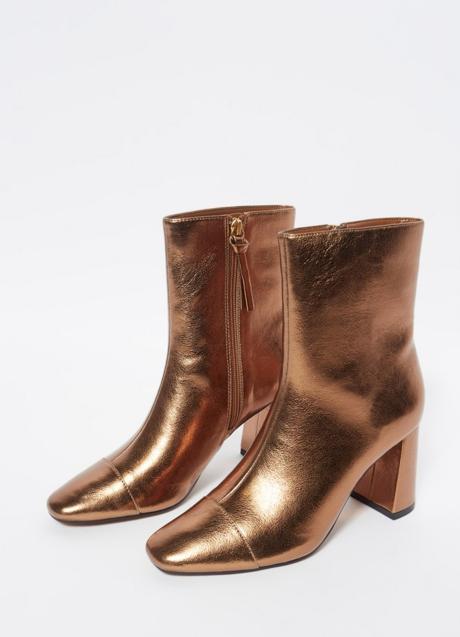 Imagen - Botines metalizados de Sfera (32,99 euros)