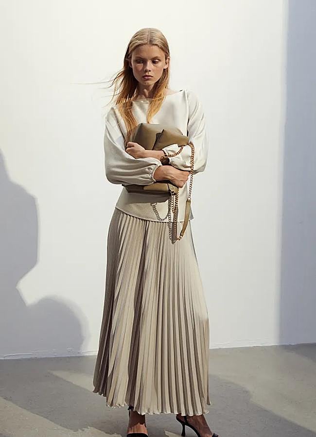 Imagen - Falda plisada midi de H&M, 39,99 euros.