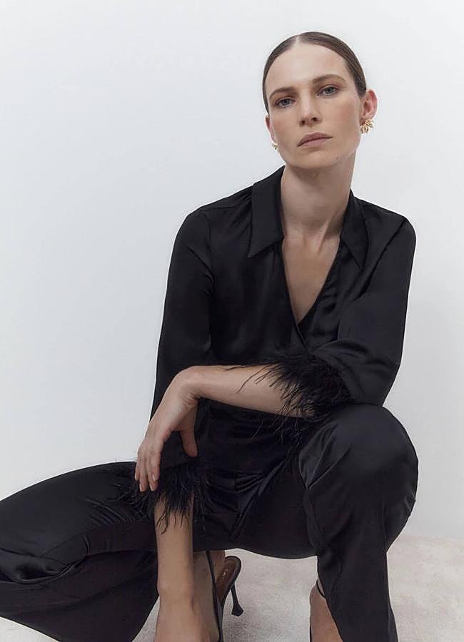 Imagen - Blusa con detalle de plumas en las mangas