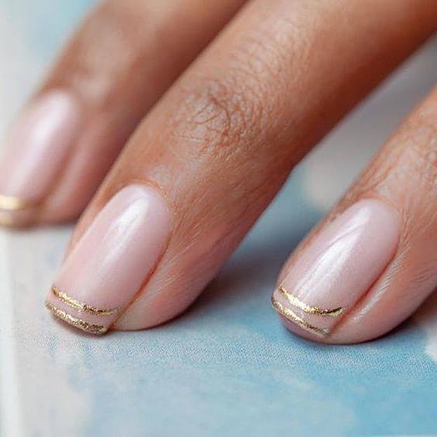 Manicura francesa doble dorada