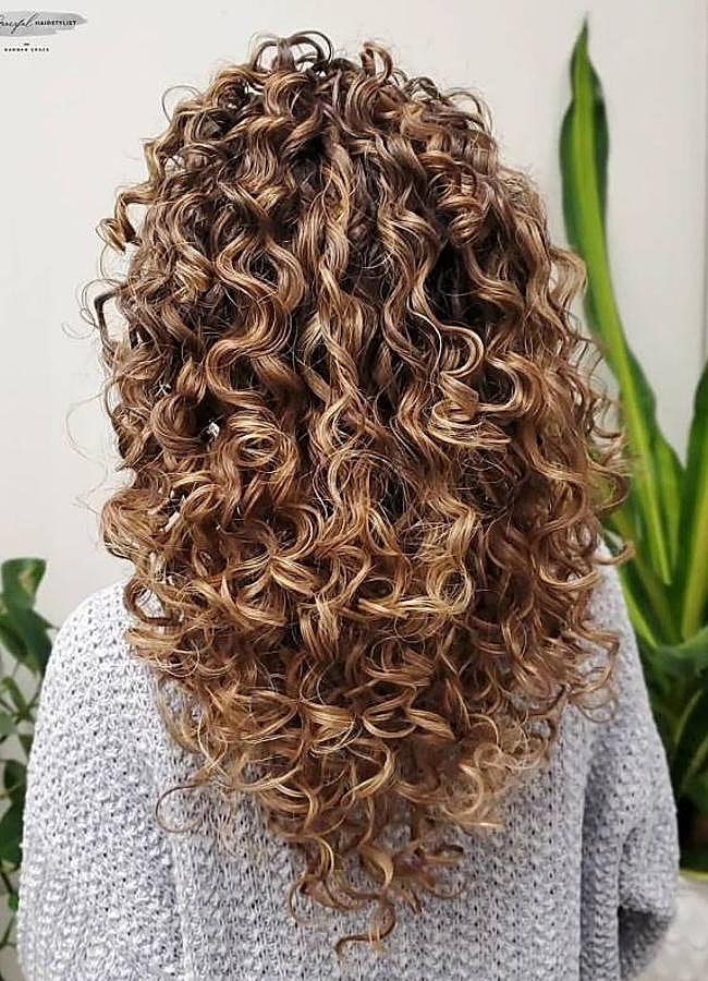 Imagen - Corte de pelo en pico para pelo rizado