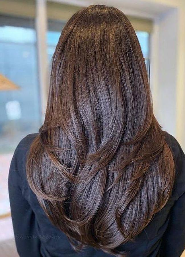 Imagen - Corte de pelo en pico con capas pluma redondeadas