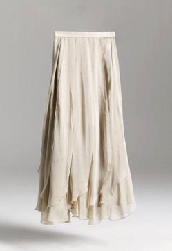 Imagen secundaria 2 - Top de The Are (34,95€)/ Falda Moonstone de Bimani (250€)/ Sandalias destalonada de Mango (39,99€)