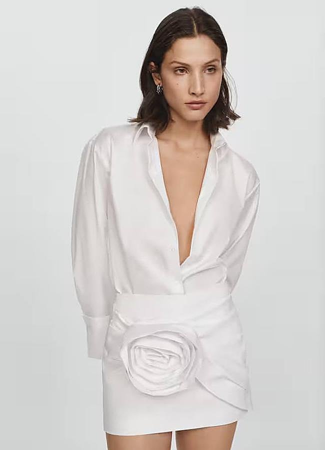 Imagen - Falda corta blanca con detalle de maxi flor