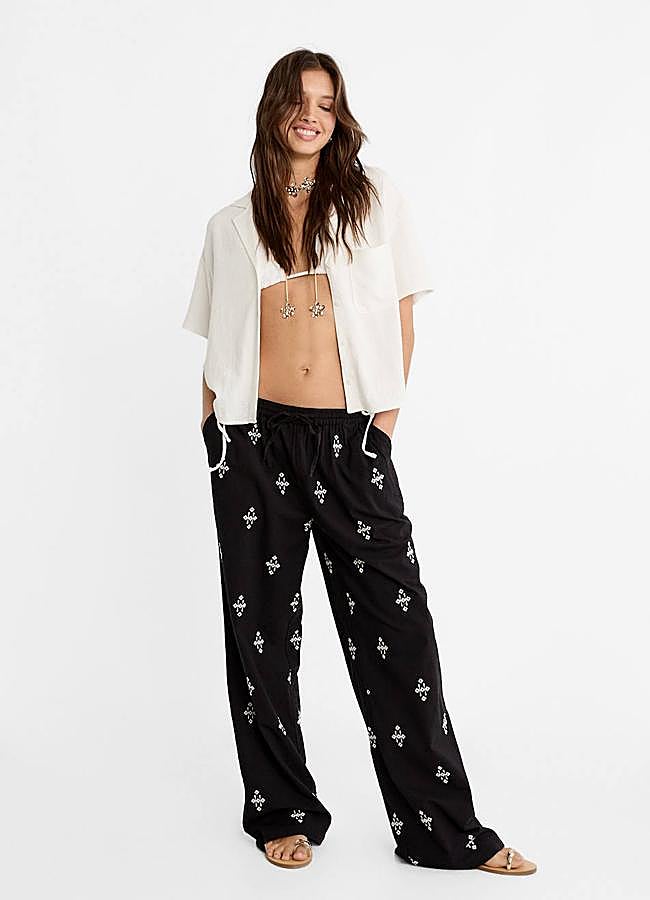 Imagen - Pantalones fluidos negros con bordados