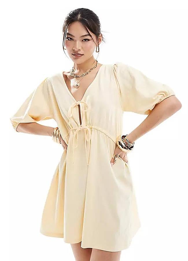 Imagen - Vestido amarillo decorado con lazos