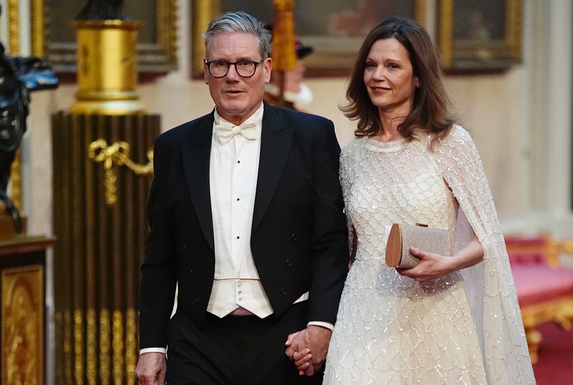 El matrimonio durante una cena de gala en Buckingham Palace.