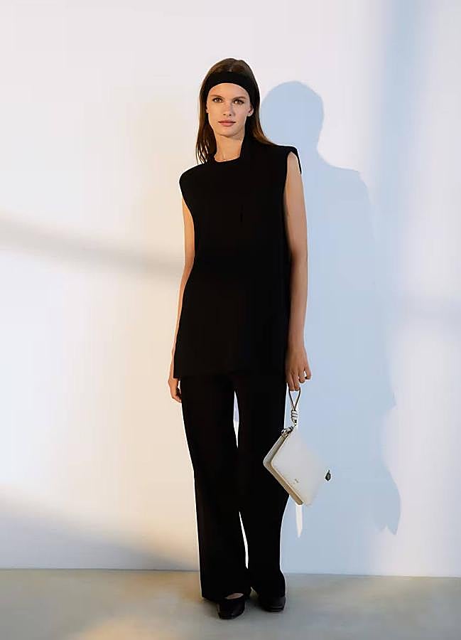 Imagen - Conjunto de punto negro con top y pantalón largo ancho