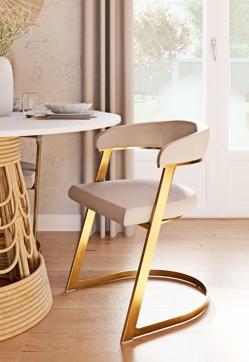 Imagen secundaria 2 - El salón de estilo Old Money es una propuesta de Westwing (c.p.v), la lámpara dorada modelo Pam es de El Corte Inglés y cuesta 169 euros. Abajo, la original silla Warren, de Maisons du Monde (259 euros).