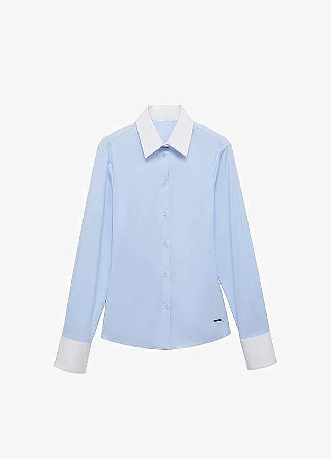 Imagen - Camisa con cuello y muñecas blanco de Mango, 49,99 euros.