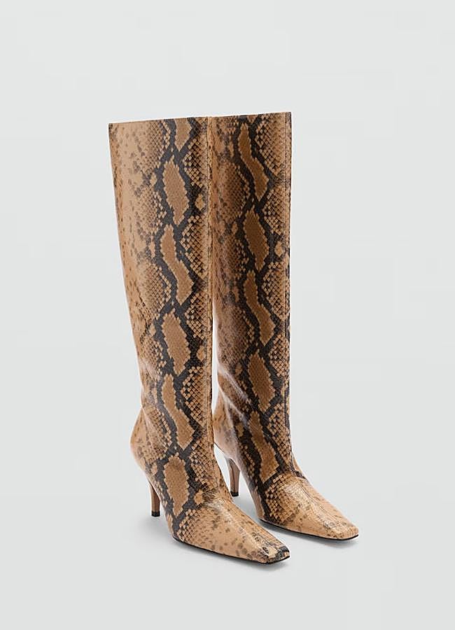 Imagen - Botas altas de piel de serpiente de Mango, 199,99 euros.