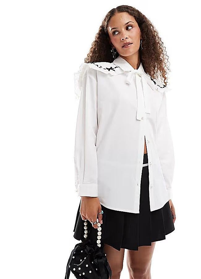 Imagen - Blusa con cuello bobo y lazo