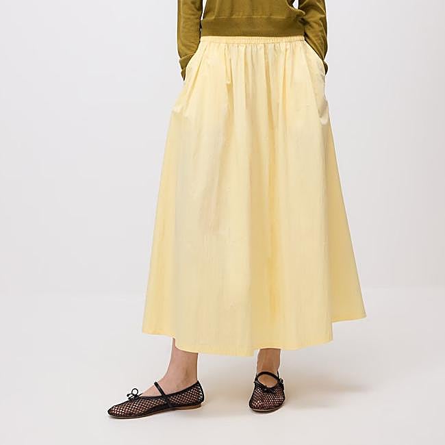 Falda de vuelo amarilla