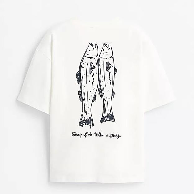 Imagen principal - Camiseta estampada de Lefties (9,99€)/ Pañuelo algodón bordados (12,95€)/ Falda midi con textura (25,99€)