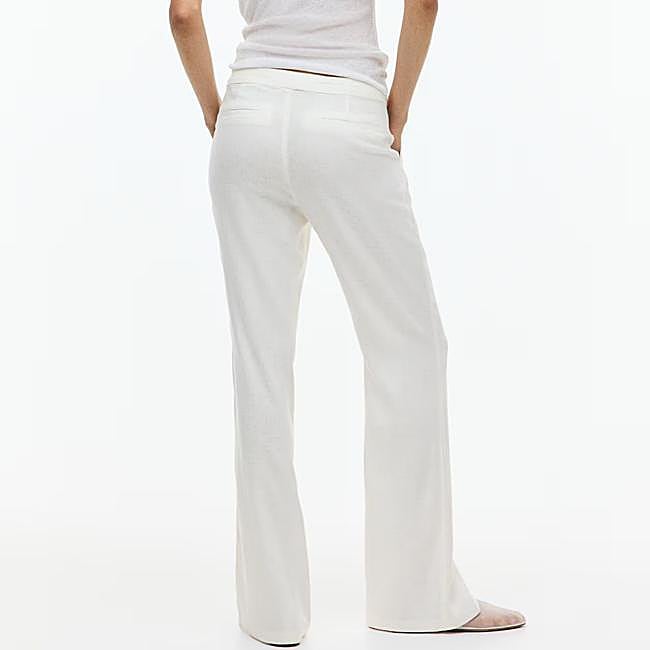 Pantalones de lino acampanados color blanco