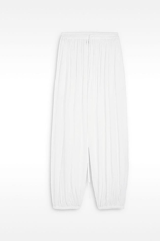 Pantalón bombacho en color blanco de Parfois.