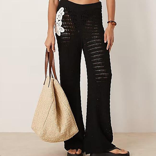 Pantalones de punto con bordado floral