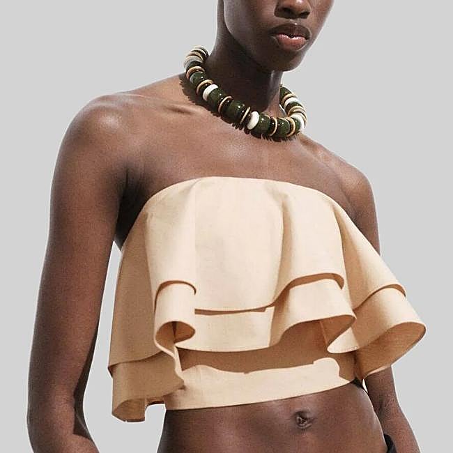 Top con volante de Mango, 35,99 euros.