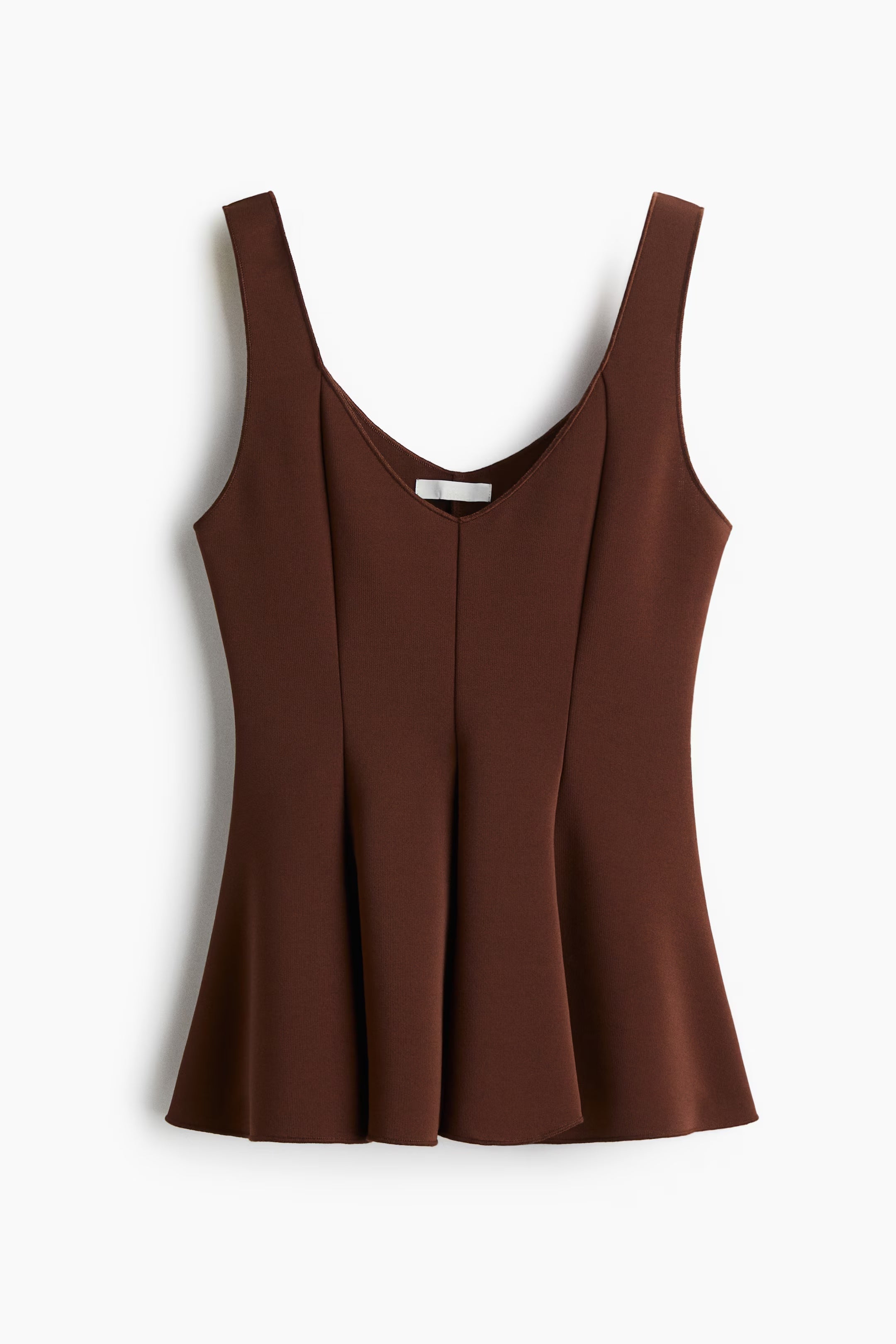 Top interlock con peplo (17,99€)