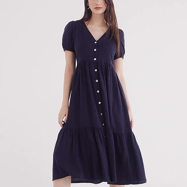 Vestido de lino camisero midi de Springfield, 19,99 euros.