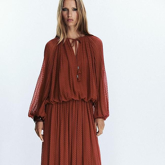 Blusa abullonada con borlas