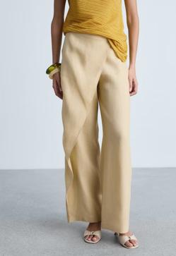 Imagen secundaria 2 - Look de Lady Pipa, bolso de Pull & Bear y pantalón pareo de Mango, todo en amarillo mantequilla.