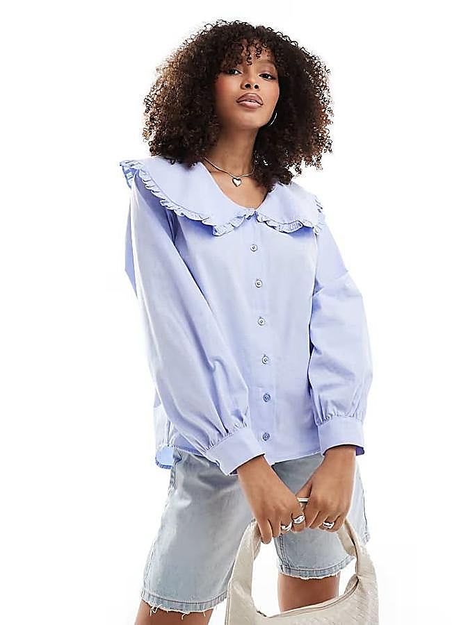 Imagen - Blusa peter pan de algodón azul bebé