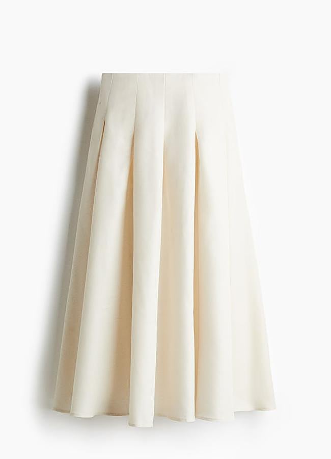 Imagen - Falda midi evasé en lino blancode H&M, 59,99 euros.